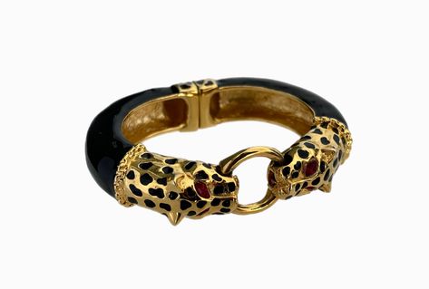 Vintage Kenneth Jay Lane KJL Black and Gold Tone Double LEOPARD Couture Collection Bracelet Condition: Pre-owned, excellent! Measurements: Inside circumference length is 6.5 inches, measures just over 0.5 inches wide Stunning vintage KJL Kenneth Jay Lane black enamel and gold electroplated double leopard head statement bracelet from the Couture Collection. Substantial piece with a secure magnetic snap closure. Signed KJL on the inside of the bracelet. Wonderful collector's piece! FREE SHIPPING, Dress Reference, Hermes Bracelet, Leopard Head, Family Jewels, Jewelry Fashion Trends, Statement Bracelet, Kenneth Jay Lane, Pretty Jewellery, Couture Collection