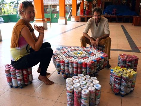 A man and a woman sit on furniture made out of ecobricks Brick Projects, Eco Furniture, Reuse Plastic Bottles, Diy Plastic Bottle, Plastic Trash, Chur, Plastic Bottle Crafts, Eco Living, Recycled Projects