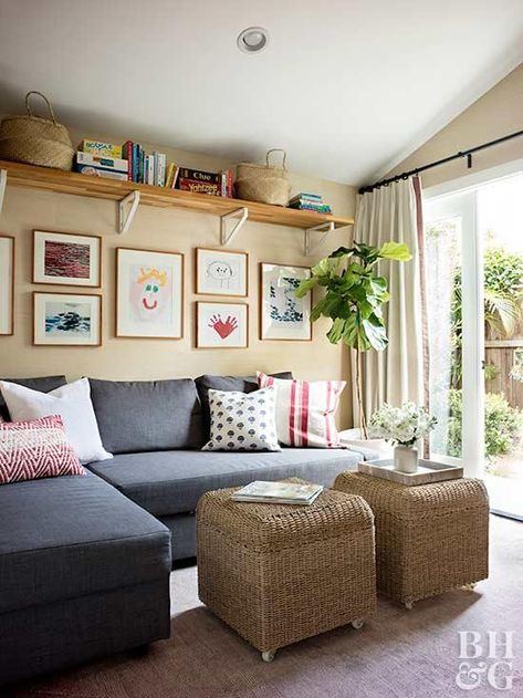 This California Bungalow Home Stays Cool in 550 Square Feet | Better Homes & Gardens High Shelves Around The Room, High Up Shelves, High Ceiling Living Room Shelves, Bungalow Living Room Ideas Small Spaces, High Shelf Decorating Ideas Bedroom, High Shelf Around Room, High Shelving Around Room, Shelves Near Ceiling, Shelves Along Ceiling