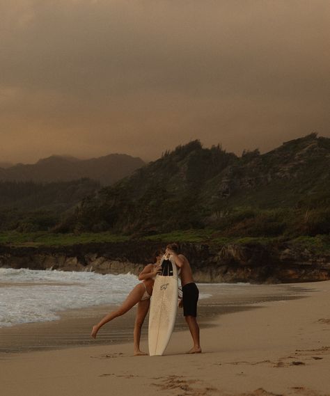 sunrise surf 💌 I will be back on Oahu for 3 weeks Nov/Dec and have availability, reach out with the link in my bio! Which photo is your favorite? - Keywords: couple, photoshoot, Oahu, Hawaii, travel, destinations, photographer, elopement, world travel, couples, engaged, surfing, photographer, cinematic, romantic, film, movie scene, love Surf Photoshoot, Maui Sunrise, Hawaii Photoshoot, Cinematic Storytelling, Sunrise Photoshoot, Couple Travel Photos, Travel Couples, Hawaii Photography, I Will Be Back