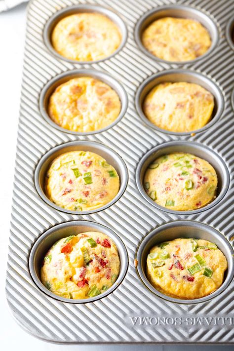 Metal muffin tin with baked egg bites. Scrambled Eggs Muffin Tin, Baked Egg Cups Muffin Tins, Baked Eggs In Muffin Tin, Egg Bites Muffin Tins, Baked Egg Bites, Starbucks Egg Bites Recipe, Bacon Bites, Eggs In Muffin Tin, Toddler Picky Eater