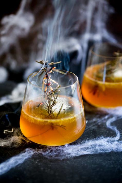 For a simple bourbon based cocktail, why not try this Haunted Graveyard Halloween cocktail. It is perfect for a fall or halloween party as it combines, bourbon and maple for a warm you up drink. Plus the creepy smoking rosemary adds a bit of  spooky fun to your drink. Everyone loves a bit of theatre and this maple, bourbon and orange cocktail is sure to impress. #fallcocktail #halloweencocktail #bourboncocktail Halloween Alcohol, Graveyard Halloween, Haunted Graveyard, Halloween Drinks Alcohol, Vegan Halloween, Halloween Cocktail, Orange Cocktails, Nice Recipes, Halloween Cocktails