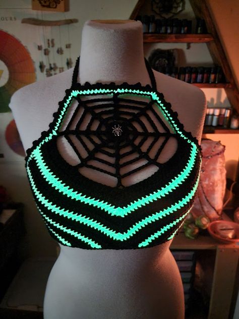 Are you as Halloween obsessed as me? If you are let me make you this one of a kind GLOW IN THE DARK spiderweb  top. Can choose any color to be stripped with. Sizes xs- xl. Spooky season is apon us! O Ring Crochet Top, Pirate Crochet Clothes, Beetlejuice Crochet Top, Spiderweb Blanket Crochet Pattern Free, Glow In The Dark Crochet Ideas, Glow In The Dark Yarn Projects, Dark Crochet Aesthetic, Crochet Glow In The Dark Patterns, Glow In The Dark Yarn Crochet Patterns