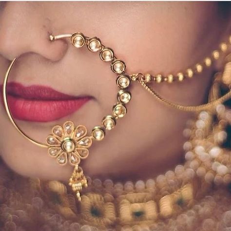 No photo description available. Nath Designs, विवाह की फोटोग्राफी की मुद्राएं, Nose Ring Designs, Bridal Nose Ring, Nose Ring Jewelry, Wedding Jewelery, Pengantin India, Indian Jewelry Earrings, Perhiasan India