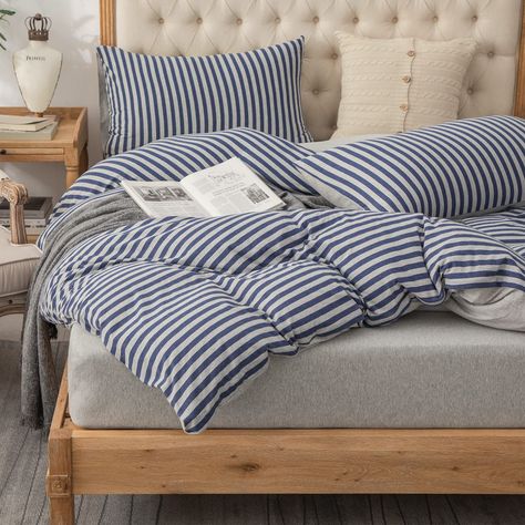 PRICES MAY VARY. Material: As comfortable as a favorite T-shirt, knit jersey duvet cover set is 100% cotton, a lightweight and durable material that becomes softer with every wash, perfect for all seasons. Super soft and cozy, it really does feel like you are sleeping in a fluffy, comfy cloud. Striped reversible design: Boasting a classic striped pattern in blue and light grey for a soothing pop of color, the solid heathered light grey on the reverse provides a second stylish look to your bedroo Striped Bedding Bedroom, Fluffy Duvet, Twin Comforter Sets, Striped Bedding, Striped Duvet, Boys Bedding, High Quality Bedding, Comfy Bed, Striped Jersey