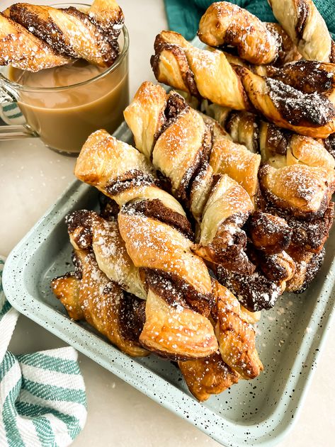 Nutella Puff Pastry Twists are the perfect easy treat when you're craving something sweet. With just three ingredients, this simple-to-make recipe is perfect for breakfast and brunch, dessert, and even as a party appetizer. via @jugglingactmama Nutella Puff Pastry Twist, Nutella Twists, Nutella Pastry, Pastry Twists, Hazelnut Dessert, Nutella Puff Pastry, Easy Puff Pastry Recipe, Puff Pastry Chicken, Puff Pastry Twists