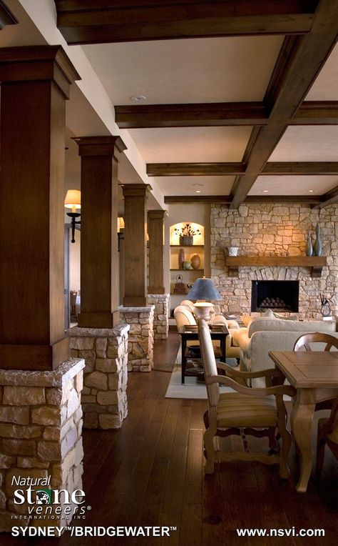 potential column look to match with wood beams on ceiling Columns Interior, Column Ideas, Columns Decor, Stone Walls Interior, Stone Fireplace Surround, Stone Accent Walls, Rustic Basement, Interior Columns, Wood Columns