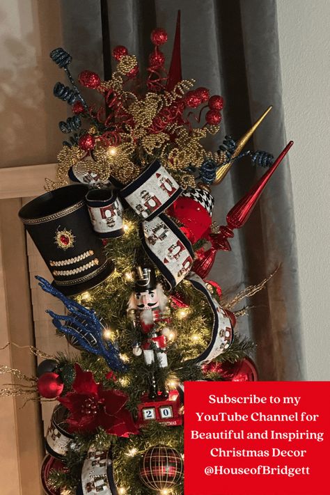 Step into the enchanting world of the Nutcracker this holiday season! Discover our comprehensive guide on creating a Nutcracker Christmas Tree, complete with decorating ideas and tips. Learn how to bring the magic of the Nutcracker ballet to your home decor and make this Christmas truly special. Nutcracker Tree Topper Diy, Nutcracker Themed Christmas Decor Ideas, Nutcracker Christmas Trees, The Nutcracker Ballet Christmas Decor, Nutcracker Christmas Tree Topper, Nutcracker Tree Theme, Nutcracker Themed Christmas Tree, Nutcracker Tree Topper, Nutcracker Ballet Christmas Tree