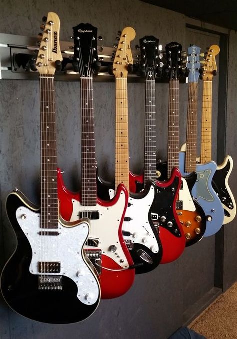 Backyard Music Studio, Guitar Hanging Ideas, Hanging Guitars, Unicorn House, Music Room Design, Guitar Storage, Guitar Display, Affordable Engagement Rings, Guitar Wall Art