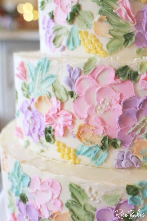 This Bridgerton-Inspired Wedding Cake is one of my all-time favorite wedding cakes. With buttercream flowers in soft pastels and tiny pearls for a touch of timeless elegance, this wedding cake is the perfect picture of the whimsy and color of a fairy tale. Cakes With Buttercream Flowers, Fairy Wedding Cake, Pastel Wedding Cake, Pastel Wedding Cakes, Wedding Cake Videos, Pastel Wedding Theme, Strawberry Cake Filling, Bridgerton Inspired, Sour Cream Cake