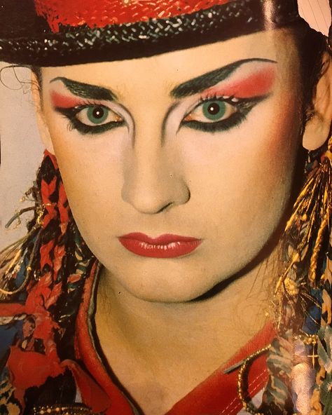 3 Likes, 1 Comments - Kim Chau (@kchau_fashiontextiles) on Instagram: “Image: the Boy George fact file. Impressive make up done by Boy George. You can see the he is very…” 80s Rock Makeup, 80s Drag, Period Makeup, 1980s Makeup, Blitz Kids, Rock Makeup, Concert Makeup, Romantic Makeup, New Wave Music