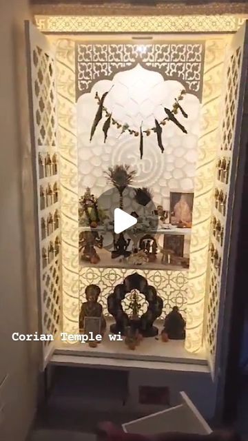 Corian mandir with pocket doors and 3d Backlit pillars and floating shelves front view video walk through Corian Solid Surface, Mandir Design, Pooja Mandir, Home Temple, Pocket Doors, Sliding Doors, Floating Shelves, Temple, Floating