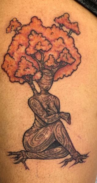 Stunning Tree Tattoos, Designs, Ideas & Meanings Friend Tree Tattoo, African Roots Tattoo, Black Woman Tree Tattoo, Black Woman Leg Sleeve Tattoo, Human Tree Tattoo, Dark Skin Women Tattoo Ideas, Mother Earth Tattoo Black Woman, Nature Tattoos Black Women, Afro Tree Tattoo