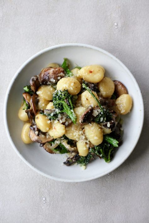 Soft and pillowy gnocchi are tossed together with a hearty mushroom, broccolini, and parmesan sauce for a delicious, vegetarian weeknight dinner. Gnocchi Easy, Gnocchi Parmesan, Gnocchi Mushroom, Mushroom Gnocchi, How To Cook Gnocchi, Parmesan Sauce, Creamy Mushrooms, More Recipes, Delicious Vegetarian