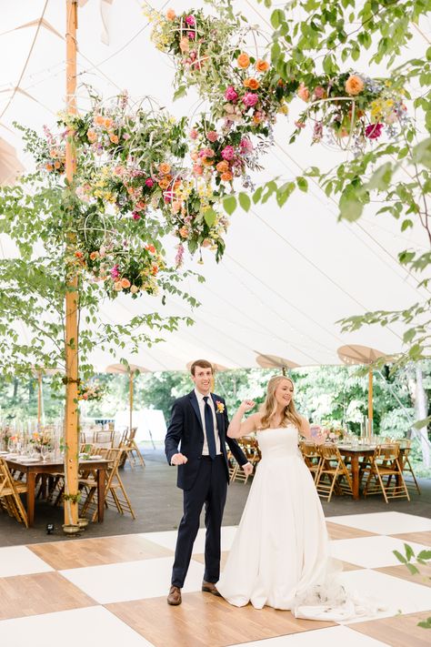 Hanging Floral Installation Above Dance Floor Spring Wedding Dance Floor, Wedding Tent Decorations Ceiling Decor Hanging Flowers, Flowers Above Dance Floor, Flowers Hanging From Tent Wedding, Checkered Dance Floor Wedding, Floral Dance Floor, Hanging Flowers Above Dance Floor Wedding, Wedding Tent Flower Ceiling, Freelance Portfolio