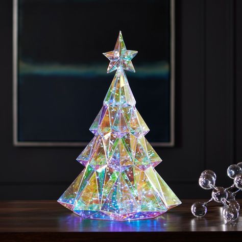 Brighten your holiday space with our Prismatic Iridescent Diamond Christmas Tree crafted by Seasonal LLC. Standing at 19 inches tall and featuring 200 LED lights, this stunning tree brings festive cheer to any indoor setting. Elevate your seasonal decor with this radiant centerpiece, meticulously designed to captivate and delight throughout the holiday season. Diamond Christmas, Tinsel Christmas Tree, Chic Holiday, Christmas Tree Crafts, Christmas Style, Ceramic Christmas Trees, Christmas Trends, Jingle All The Way, Christmas Tree Themes