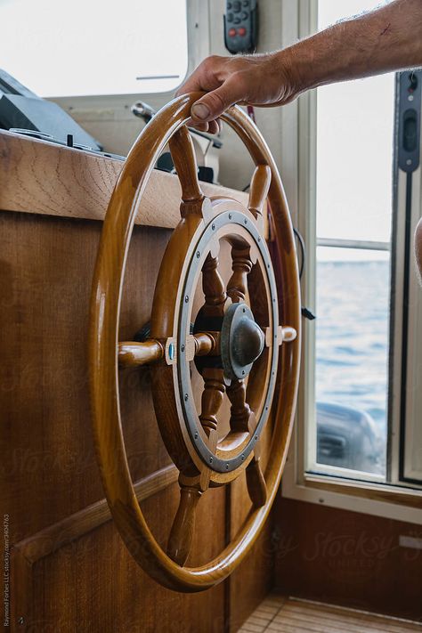 Stock Photo of Captain Steering ship and staying the course Boat Captain Aesthetic, Hand On Steering Wheel, Ship Steering Wheel, Boat Photography, Pirate Crew, Boat Wheel, Red Raider, Summer Boats, Boat Captain