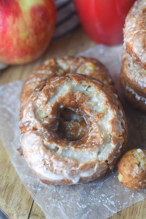 Apple cider donuts are loaded with fresh apples. Crunchy on the outside, cakey and tender on the inside. And topped with an apple cider glaze! #donuts #applecider Donuts Fried, Apple Cider Glaze, Apple Cider Donuts Recipe, Yeast Donuts, Turnover Recipes, Biscuit Recipes, Donuts Recipe, Easy Party Food, Apple Cider Donuts