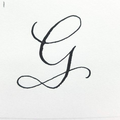 This dip pen calligraphy letter G is part of a watercolor and ink style study by Joanne Groff at The Painted Pen. Cursive Letter G, Letter G Tattoo, White Rose Tattoo, Black And White Rose Tattoo, Tattoo Cursive, G Calligraphy, Dip Pen Calligraphy, Fonts Lettering, G Tattoo