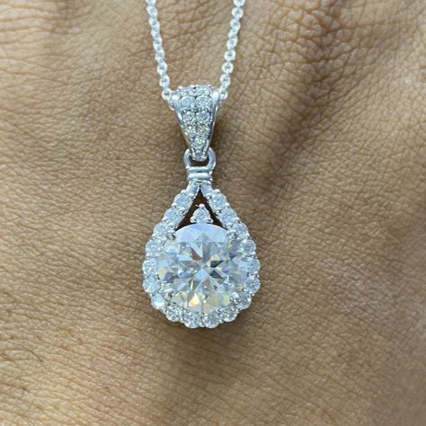 2 CTW Round Cut Moissanite Halo Pendant, Moissanite Wedding Pendant, 14K Solid White Gold Pendant, Anniversary Gift for Her, Women Pendant Available On Etsy https://www.etsy.com/in-en/listing/1748487030/2-ctw-round-cut-moissanite-halo-pendant?click_key=799374360b018447af7fe5db151f0b6e2b4df9c1%3A1748487030&click_sum=d39c2dad&ref=shop_home_active_1&pro=1&frs=1 Center Stone: 8mm Round Cut Moissanite Side Stone: Moissanite Cut: Excellent Color: DEF Clarity: VVS1 Mohs Hardness: 9.25 Setting: Pr... Wedding Pendant, Women Pendant, White Gold Pendant, Halo Pendant, Anniversary Gift For Her, Gold Platinum, Gold Pendant, Anniversary Gift, Round Cut