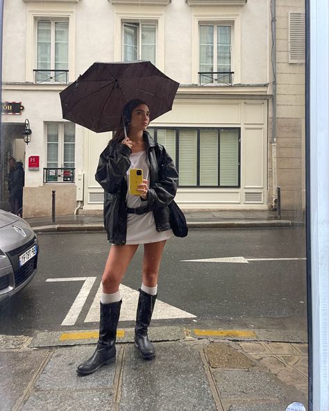 rainy paris fit long t shirt belt grunge biker boots long socks fitspo fashion girlies Long Socks With Boots Outfit, Black Motorcycle Boots Outfit, Skirt And Biker Boots Outfit, Mui Mui Boots Outfit, Rainy Street Style, Tall Boots Summer Outfit, Knee High Biker Boots Outfit, Outfits With Moto Boots, Miumiu Boots Outfit