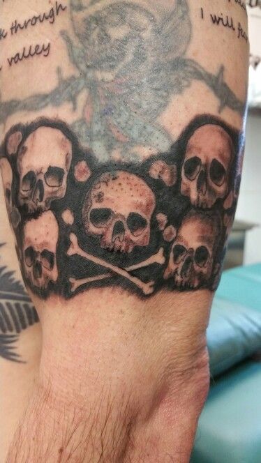 Skull Arm Band Tattoo, Skull Band Tattoo, Skull Pile Tattoo, Stacked Skulls Tattoo, Skull Filler Tattoo Ideas, Catacombs Tattoo, Skull Bracelet Tattoo, French Catacombs, Skull And Bones Tattoo