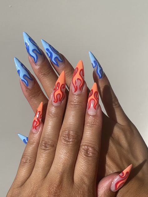 Nail design, blue flame nails and orangy red flame nails Short Flame Nails Designs, Blue Fire Nails Designs, Grey Flame Nails, Red And Orange Flame Nails, Intricate Nail Designs Nailart, Fire And Ice Nail Designs, Fire Themed Nails, Fire Sign Nails, Red And Blue Nails Acrylic