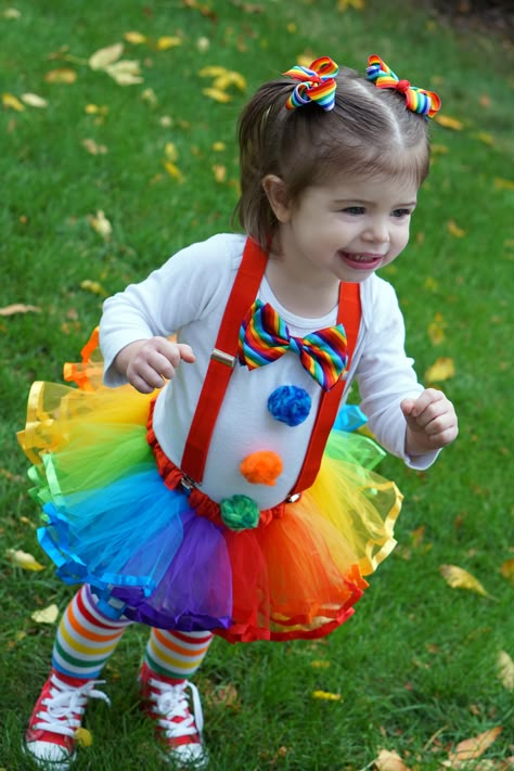 Toddler Clown Halloween Costume! Red Converse shoes, rainbow tights, red suspenders, rainbow tutu. <3 Toddler Clown Costume, Baby Clown Costume, Rainbow Tights, Clown Halloween Costume, Red Converse Shoes, Toddler Tights, Dress Up Ideas, Clown Halloween Costumes, Halloween Costumes Ideas