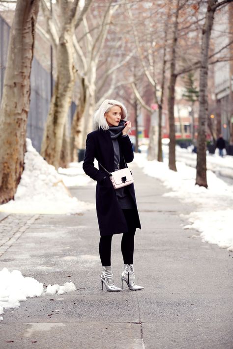 I love this look so much! It's my classic look with a bold shoe addition and enough layers to survive the snow! Metallic Boots Outfit, Silver Leather Jacket, Boots Outfit Ideas, Silver Ankle Boots, Sparkly Boots, Coated Leggings, Black Flare Pants, Boots Outfit Ankle, Gold Boots