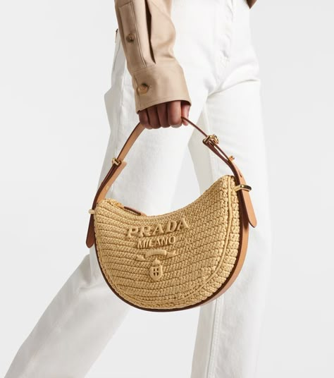 Prada Arqué raffia-effect shoulder bag in beige - Prada | Mytheresa Prada Summer Bag, Mini Crochet Bags, Prada Summer, Rafia Bags, 2025 Summer, Leather Crochet, Spring Sunglasses, Luxury Stuff, Alesha Dixon