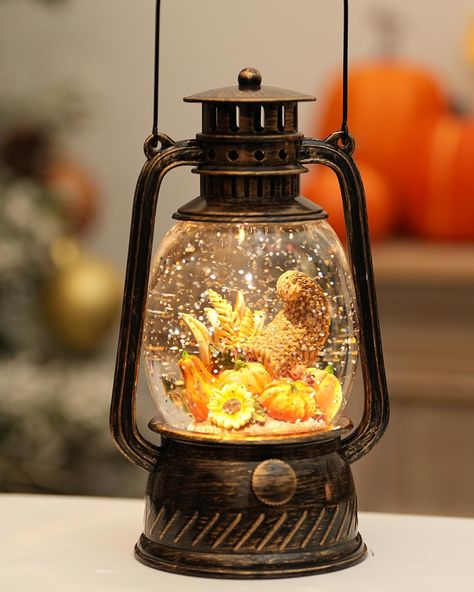 PRICES MAY VARY. Fall Decor Fall Snow Globe : Pumpkin Sunflowers use exuberant and various colors to show the adorable sence. They will be a lovely landscape to your Thanksgiving decoration, adding special charm to the festive home decoration.Ideal for fall gift.(no music) 2 Power Modes: With the included USB cable, the snow globe lantern can be operated without batteries, which can save you a lot on batteries. On the other hand, you can also power the lantern with 3 AA batteries (Not Included), Globe Pumpkin, Minimal Fall Decor, Fall Urn, Fall Snow, Globe Lantern, Fall Decorations For Home, Vintage Fall Decor, Thanksgiving Projects, Harvest Thanksgiving