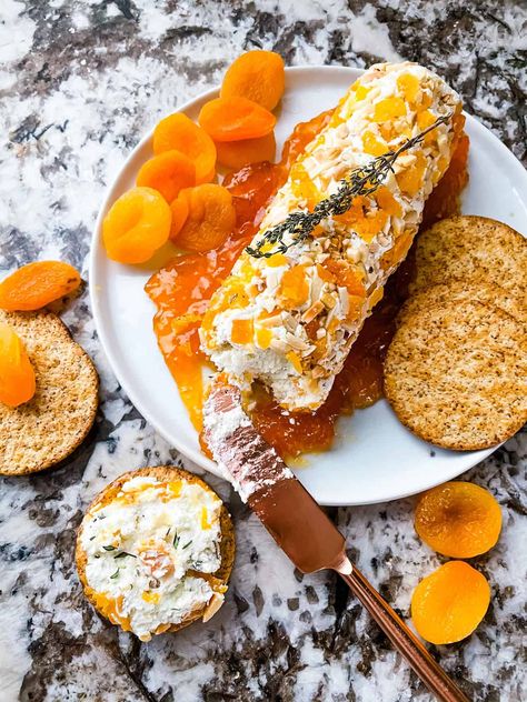 This Apricot Almond Goat Cheese Log is a fast and easy goat cheese appetizer recipe. Perfect for a party or holiday gathering. Gluten free, sweet and salty. #goatcheeselog #goatcheeseappetizer #apricotrecipes #holidayappetizer Goat Cheese Recipes Appetizers, Cheese Appetizers Easy, Goat Cheese Log, Goat Cheese Spread, Goat Cheese Appetizer, Cheese Log, Apricot Recipes, Cheese Appetizer, Goat Cheese Recipes