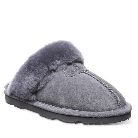 PRICES MAY VARY. Slip-On Sheepskin Lining Comfort sheepskin footbed Lightweight and cushion molded outsole Imported The BEARPAW Loki is a plush way to start your day. These slippers feature soft suede uppers with a sheepskin collar that is easy to maintain and offers the utmost in comfort. Our sheepskin lining regulates body temperature to keep your feet warm, and the sheepskin footbed provides additional softness and reduces foot fatigue. The durable rubber outsole makes this the perfect indoor Bearpaw Slippers, Most Popular Shoes, Best Slippers, Shoe Company, Women's Slippers, Womens Slides, Bearpaw Boots, Shoe Style, Soft Suede