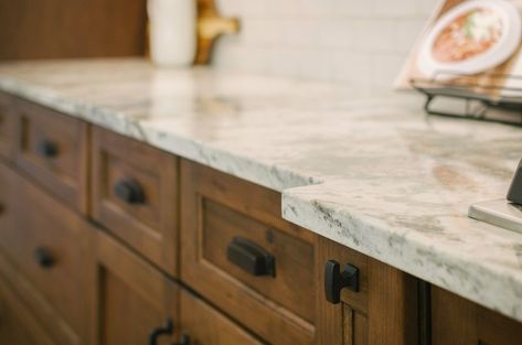 Honed vs. Polished Granite: What's The Best Deal? | Granite Selection Sienna Bordeaux Granite, Honed Granite Countertops, Kitchen Cabinet Style, Granite Polish, Warm Meals, Decorative Window Treatments, Funky Lighting, High Gloss Kitchen, Walls Decor