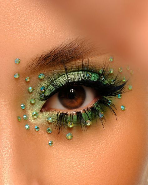 Fashion Editorial Eye Makeup, Stick On Jewels Face Eye Makeup, Glinda The Good Witch Makeup, Circus Makeup Pretty, Chunky Glitter Eye Makeup, Eye Gems Makeup, Green Glitter Makeup, Dragon Makeup, Circus Makeup