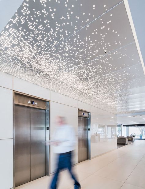 Custom perforated metal ceiling system for NCX 6060 Aesthetic False Ceiling, False Ceiling Ideas, Perforated Metal Panel, Interior Ceiling Design, Ceiling System, Office Designs, Modern Office Design, Ceiling Ideas, Lobby Design