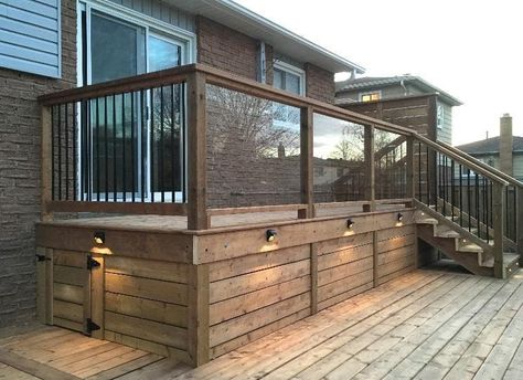 35+ Easy & Inexpensive Deck Skirting Ideas and Designs (2021) Multiple Level Deck Ideas, Wood Underpinning, Bilevel Deck, Front Deck Ideas Entrance Porch Designs, Shed Under Deck, Split Level Deck, Deck Lattice, Porch Skirting, Small Decks