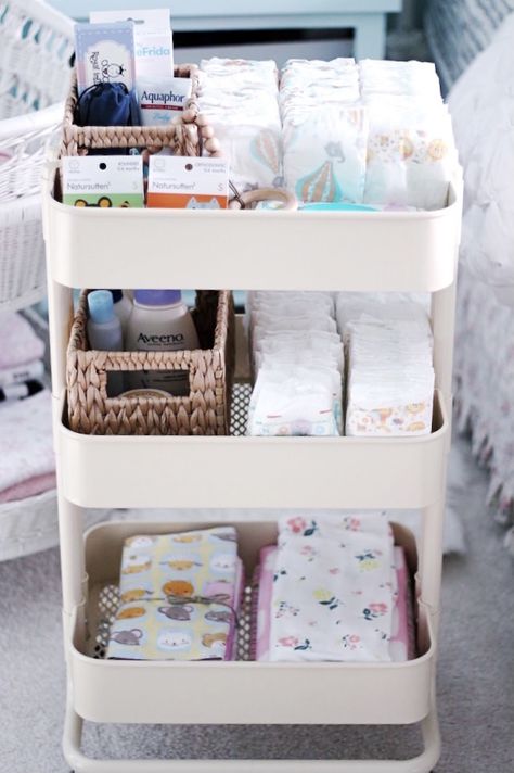 My Nursing Station Setup & Stylish Nursing Cart Roundup Ikea Nursery Hack, Nursery Hacks, Ikea Raskog, Ikea Nursery, Baby Nursery Organization, Baby Nursery Inspiration, Baby Room Organization, Baby Storage, Nursery Closet