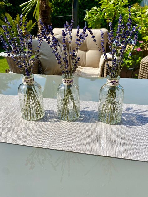 Lavender bouquet dried in glass vase with decorative ribbon lavender motif Dimensions height approx. 25 cm Do you love the wonderful sight of the blooming lavender fields in Provence? Then this enchanting lavender bouquet is definitely a nice decoration idea for you! Visit our online shops: https://www.etsy.com/de/shop/Pamplex www.Pamplex.de Use our dried flowers for example for: ❋ for DIY projects ❋ as a boho or ethnic decoration ❋ Decoration in floor vases or vessels ❋ as an arrangement ❋ as a Dried Lavender Bouquet, Lavender Centerpieces, Lavender Decor, Natural Table, Lavender Bouquet, Lavender Garden, Lavender Plant, Plant Vase, Lavender Wedding