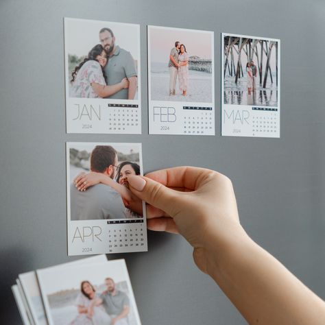 Transform your fridge into a gallery of cherished memories with our Custom Photo Magnetic Calendar! The perfect gift for yourself or your friends, this unique item allows you to display 12 of your favorite photos stylishly and practically. Key Features: * PERSONALIZED DESIGN: Choose 12 of your best photos to create a year-round memories display. * High-Quality Printing: We ensure each photo shines with clarity and color on durable magnet sheets. * Gift-Ready Packaging: Our calendars come in beau Business Calendar Design, Craft Magnets, Calendar Photography, Magnet Calendar, Custom Photo Magnets, Unique Magnets, Personalized Calendar, Business Calendar, Today Calendar