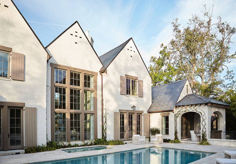 Backyard With Pool, French Country Exterior, Coastal Color Palette, Harrison Design, Tudor House, Slate Roof, Countryside House, Floor To Ceiling Windows, English Style