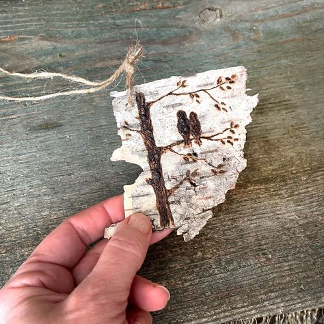 This is a handmade accent or gift tag made with real birch bark. They feature birds sitting on branches. You can use these rustic tags in numerous ways to add unique accents to your home decorating. You may want to wrap all your gifts with a natural birch bark tag! They are really fun to use with vintage books or to tie around the vase on your table centerpiece. Many people enjoy using these tags as a whimsical bookmark! -To make these tags I collect birch bark from the woods I live near.  -I ha Birch Bark Christmas Tree, Birch Bark Christmas Ornaments, Birch Bark Crafts Diy, Birch Bark Art, Birch Decorations, Birch Bark Decor, Tree Bark Crafts, Bark Idea, Birch Art