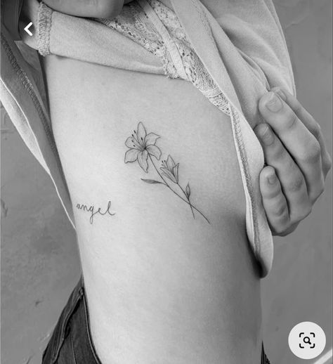 Lily Flower Rib Tattoo, Water Lily Rib Tattoo, Lily Fineline Tattoo, Fine Line Lily Flower Tattoo, Fine Line Flower Tattoo Placement, Chrysanthemum Rib Tattoo, Fine Line Lilly Tattoo, Fineline Lily Tattoo, Lily Rib Tattoo