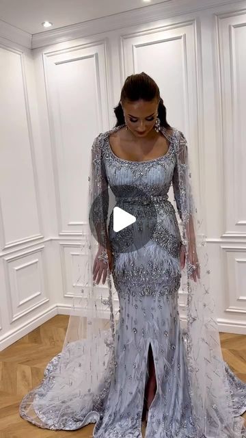 Masafi Couture on Instagram: "Feathers ✅ Cape dress ✅ Beading ✅" Gown Hairstyles, Gown With Cape, Dress Beading, Feather Cape, Western Gown, Arabian Dress, Dress With Cape, Cape Gown, Cape Dress