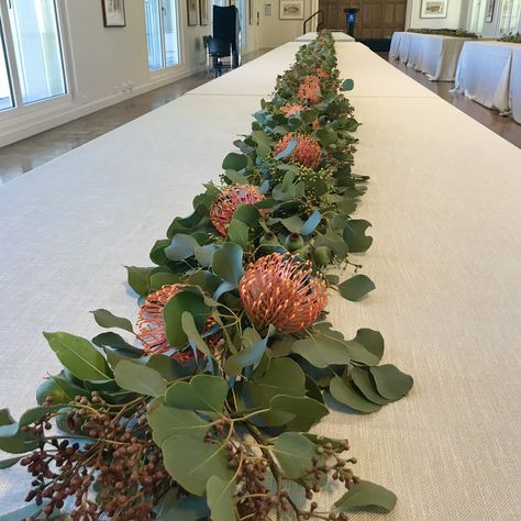 Gum Foliage, Gum Nuts and Leucospermum Table Runner Table Florals, School Dinner, Gum Leaves, School Dinners, Wedding Vision, Long Table, Flower Ideas, Tree Wedding, Christmas 2023