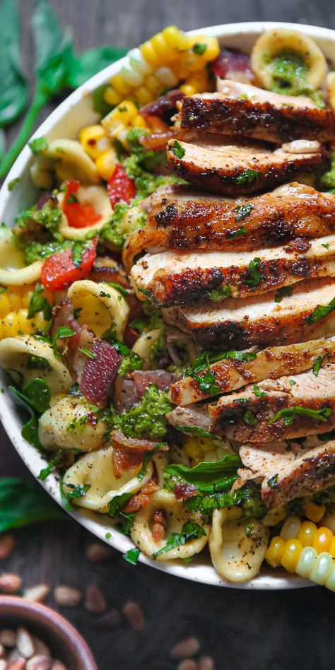 Summer Pasta with Chicken, Corn, Bacon, Bell Peppers, and Creamy Pesto Dressing - in a white bowl. Creamy Pesto Dressing, Pasta Salad With Bacon, Fresh Corn On The Cob, Pasta Bacon, Bacon Pasta Salad, Cold Pasta Dishes, Grilled Chicken Pasta, Chicken And Corn, Chicken Bacon Pasta