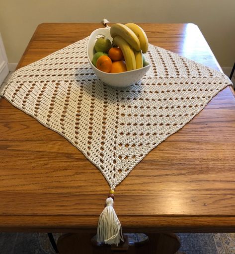 This square table topper can serve as a base for a beautiful flower arrangement , bowl of fruit or plant, but it will also dress up a table on it’s own. The pattern is a geometric swirl that is happy playing all by itself. Hand crocheted with 100% cotton in a soft ivory color. It measures Hostess Gifts Bridal, Table Decor Farmhouse, Crochet Cup Coaster, Crochet Table Topper, Contemporary Crochet, Coaster Projects, Neutral Baby Gifts, Gender Neutral Baby Gifts, Crochet Carpet