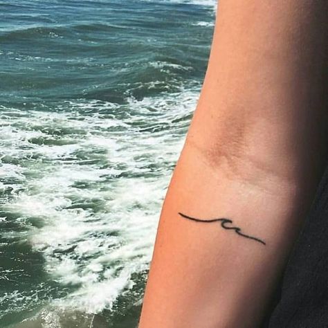 Tiny wave tattoo on the inner arm - Tattoogrid.net Inner Elbow Tattoos, Tattoo Wave, Tattoo Son, Wave Tattoo Design, Wave Tattoo, Muster Tattoos, Elbow Tattoos, Beach Tattoo, Tattoos Geometric