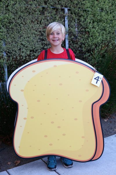 Artisan Toast | You know that the debate about the price of toast in San Francisco is over when the much-discussed “$4 slice of toast” becomes a kid’s Halloween costume. All it takes is an old-fashioned sandwich board costume or a foam mattress topper cut to size and voila—your child is a meme. Bread Costume Diy, Toast Costume Diy, Sandwich Costume, Toast Costume, Bread Costume, Butter Costume, Foam Board Projects, San Francisco With Kids, Clever Costumes