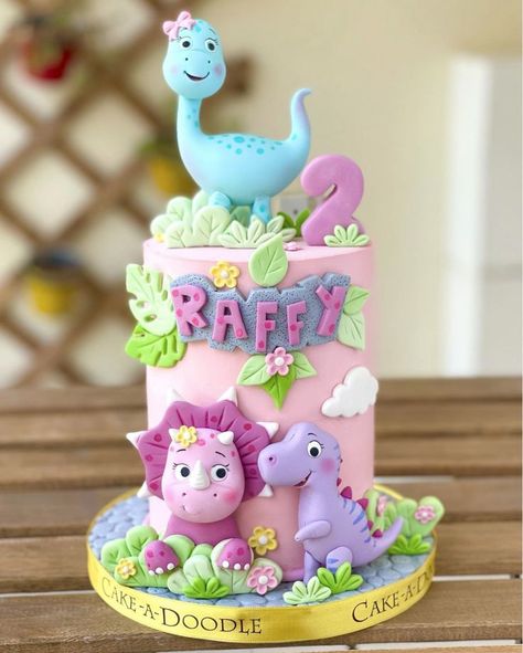 Birthday, Dinosaurs, Pastels, Chocolate, Fondant, Modeling - @cakeadoodle.qa Baby Dinosaur Cake, Dinasour Birthday, Dino Birthday Cake, Girl Dinosaur Birthday, Dinosaur Birthday Party Decorations, Dino Cake, Dinosaur Birthday Cakes, Cute Dino, 4th Birthday Cakes